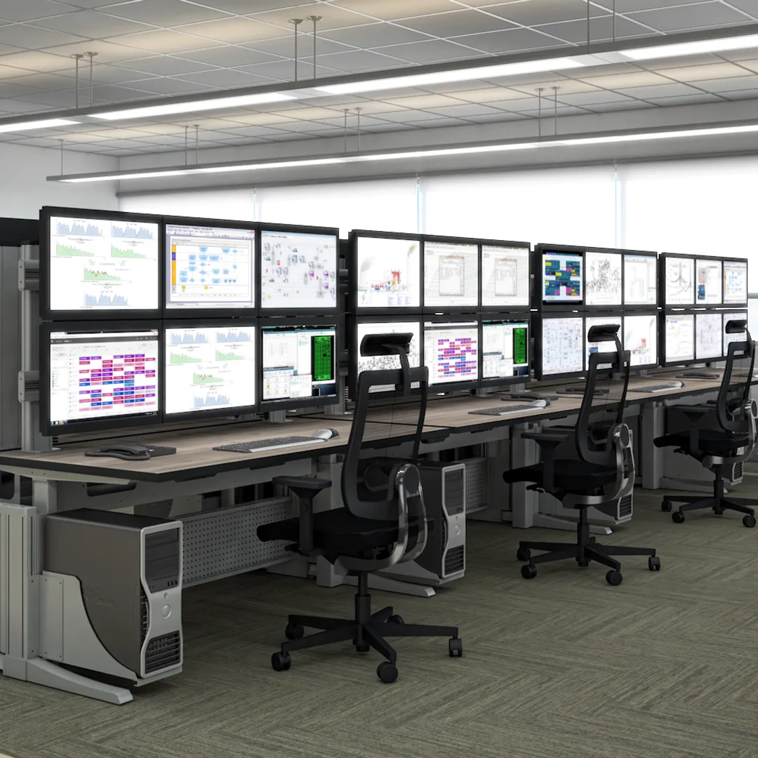 Security control room consoles each with multiple screens